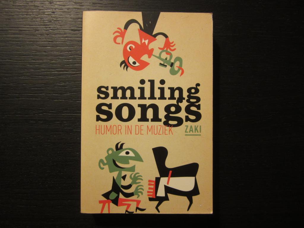 Smiling Songs -Humor in de muziek-  Zaki, Ophalen of Verzenden