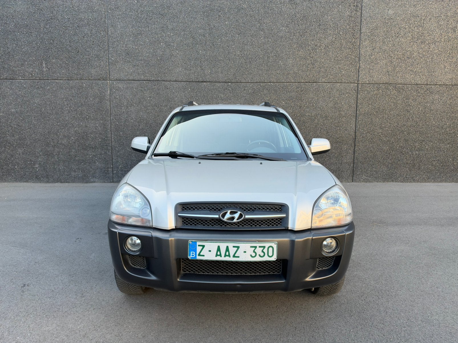 Hyundai Tucson 2.0i benzine - 90.000 kms, Auto's, Voorwielaandrijving, Stof, Zwart, 4 cilinders