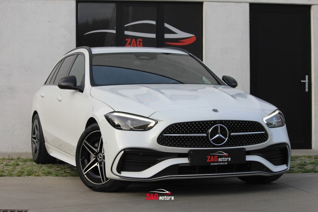 Mercedes C180 AMG | 16.000km | Automaat | Burmester | ACC, Auto's, 4 cilinders, Wit, https://public.car-pass.be/vhr/fc8e2f2e-96bb-4c7c-b6db-b0dd59248ed3