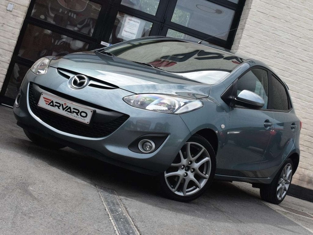 Mazda 2 1.3i Sport Navigator / PDC / Verw Zetels / Airco / T, Autos, Mazda, Entreprise, Boîte manuelle, 1485 kg, Electronic Stability Program (ESP)