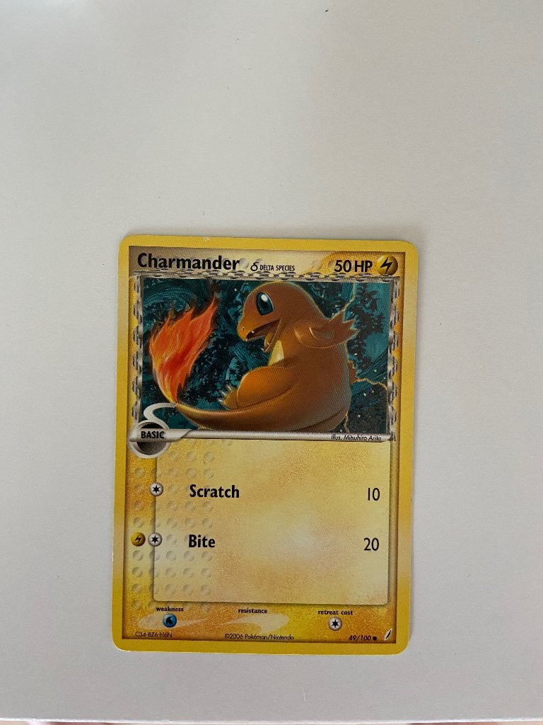 Charmander 49/100 Delta Species Pokemon Card NM, Hobby en Vrije tijd, Verzamelkaartspellen | Pokémon, Ophalen of Verzenden, Zo goed als nieuw