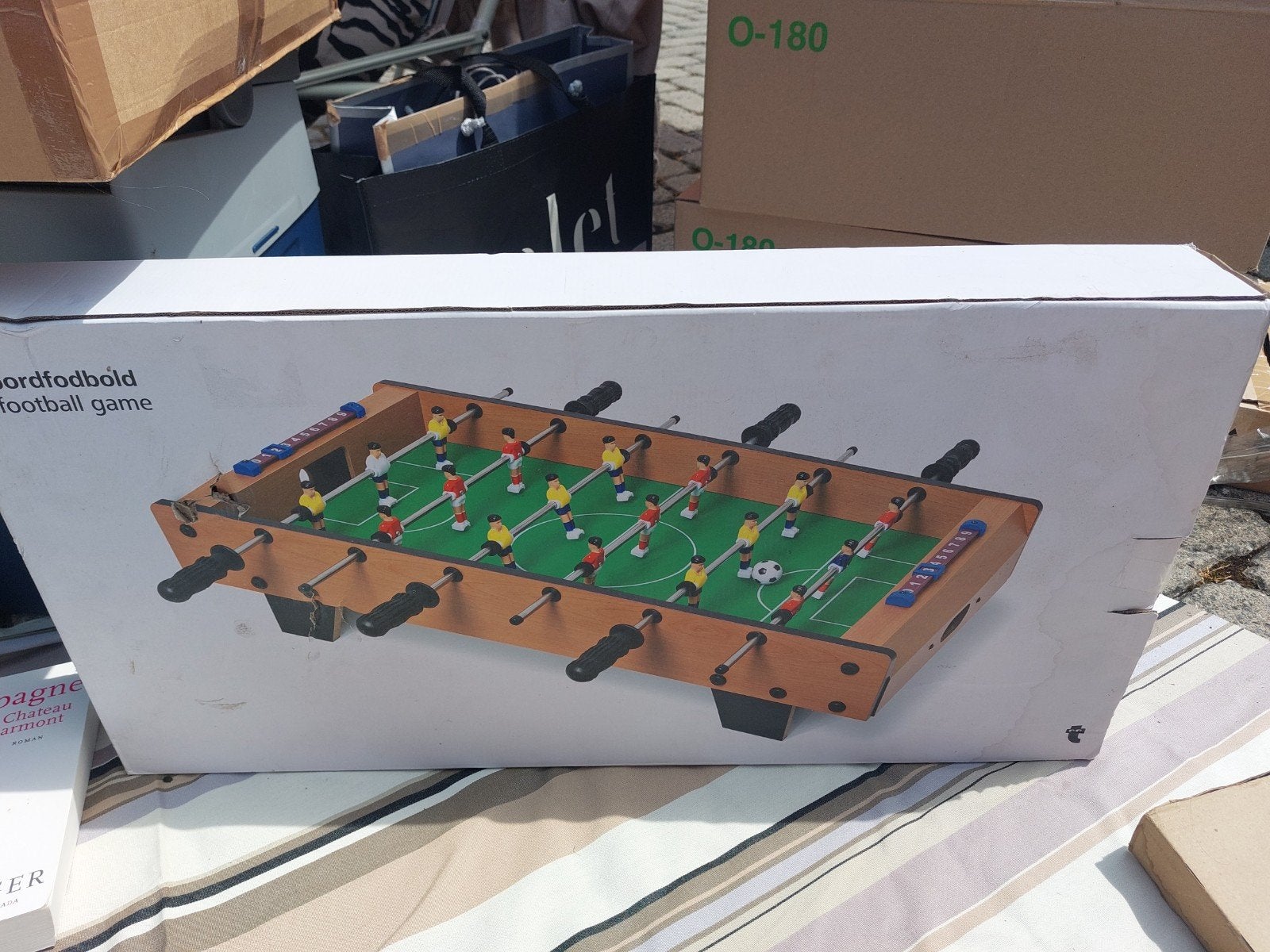 Nieuw! Houten minivoetbal!, Ophalen