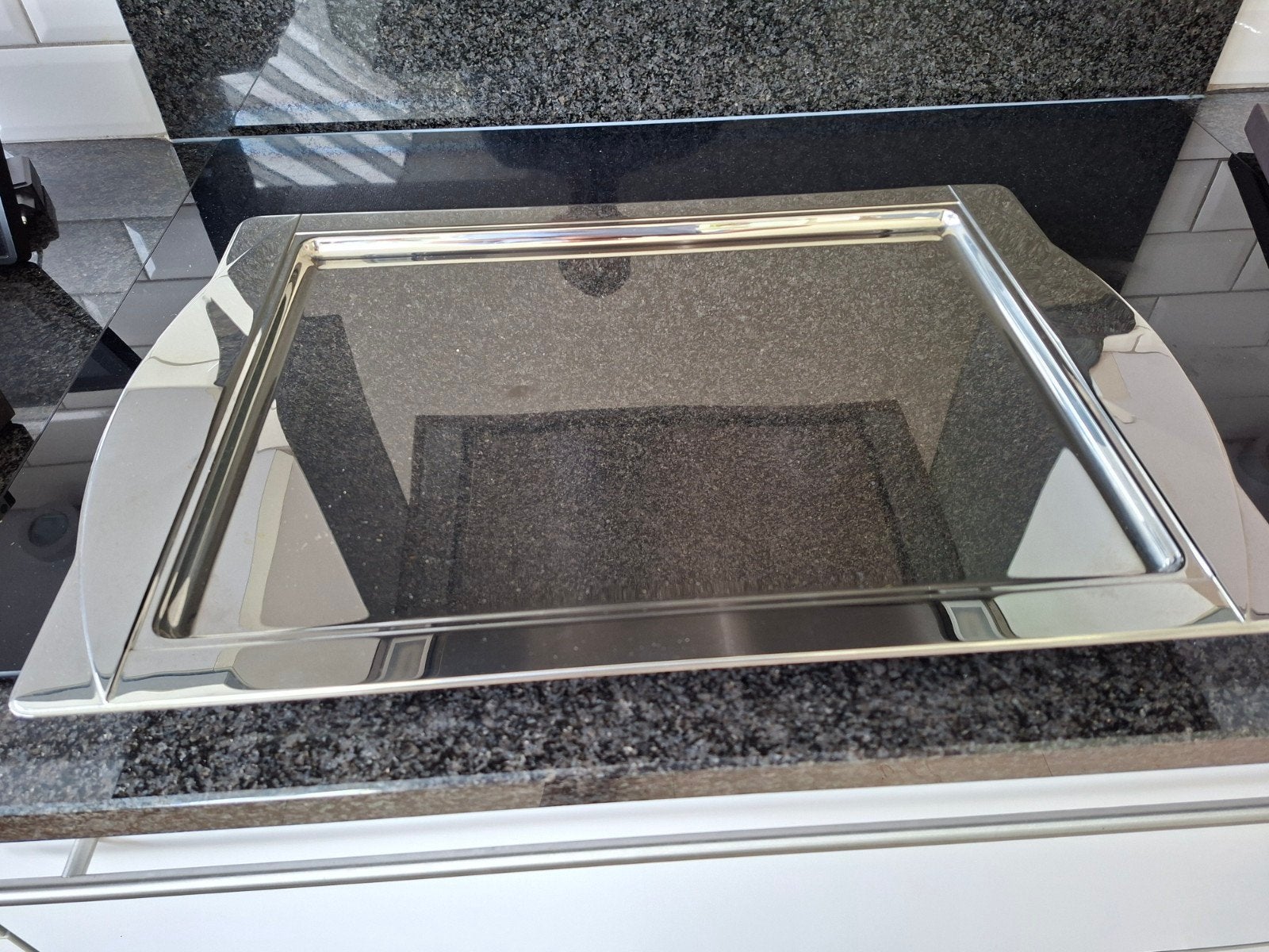 Groot presenteerblad inox, Ophalen