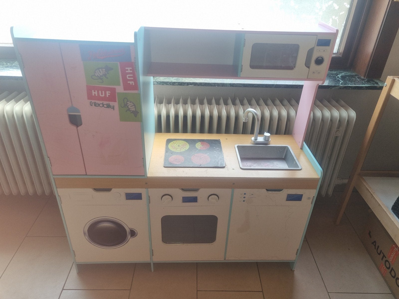 Houten speelgoed keuken, Ophalen