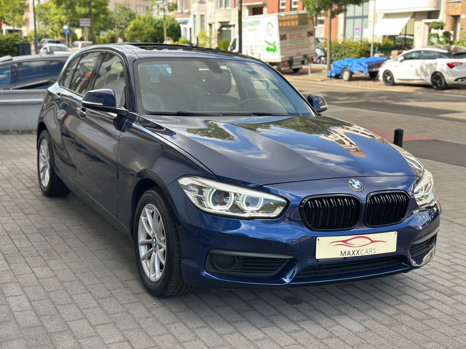 BMW 118d Sport 150pk 7/2016 Open dak Leder Xenon Pdc Navi, Auto's, Dealer onderhouden, 1995 cc, Blauw, Leder