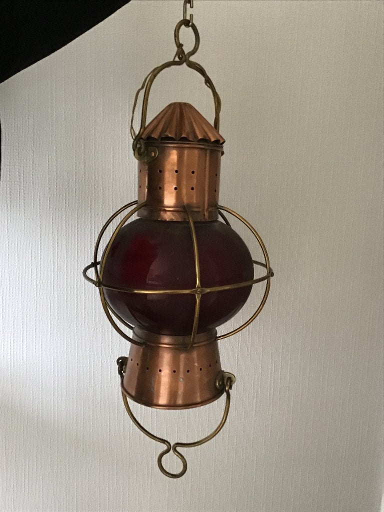 Antieke koperen scheepslamp, Ophalen