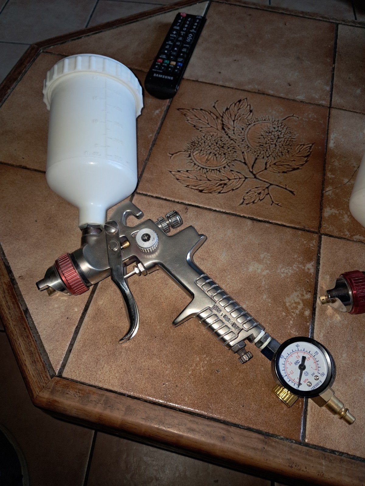 Deltalio 1.4 verfpistool met hand, Ophalen