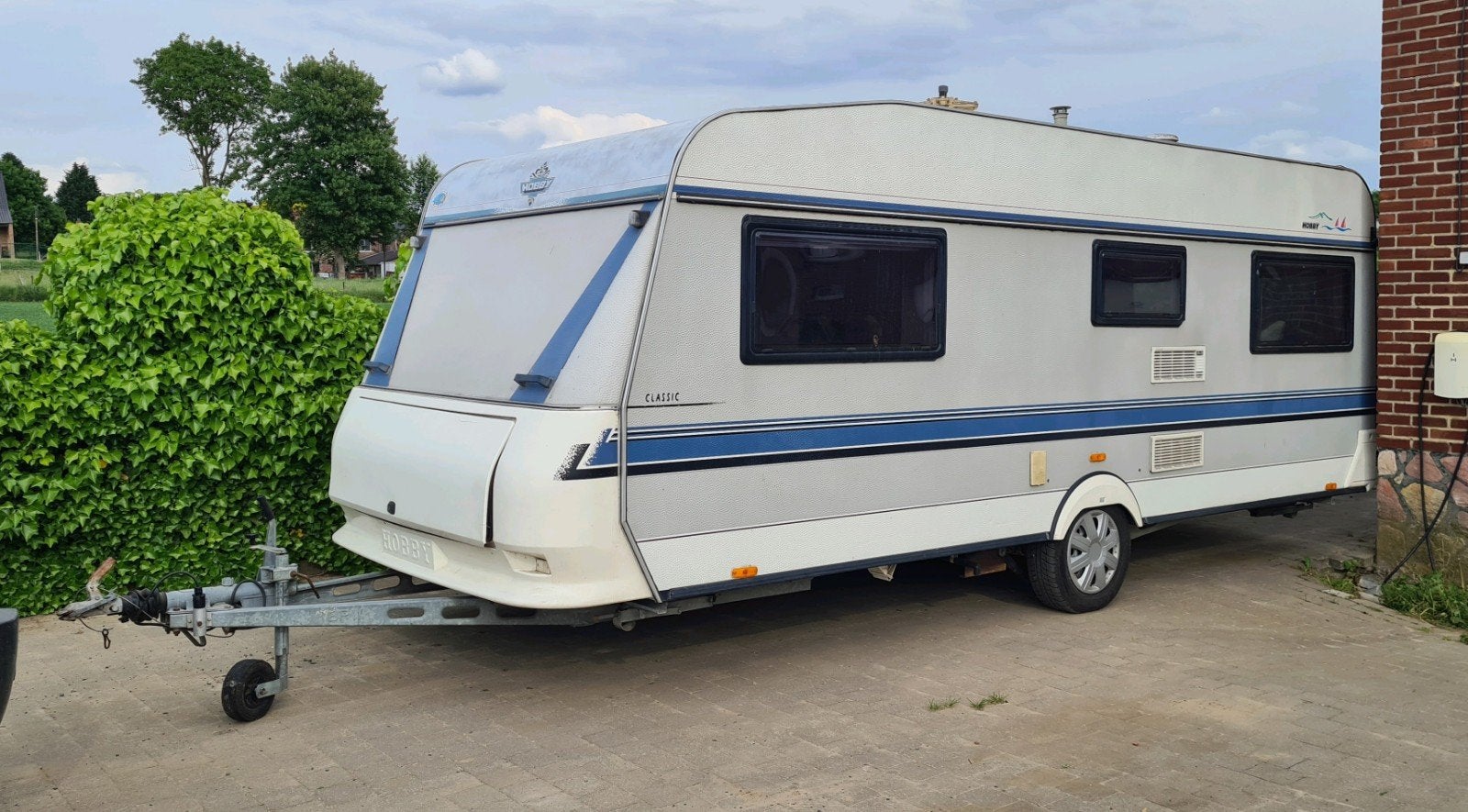 Hobby 545 caravan dubbel bed rondzit, Caravanes & Camping, Caravanes, Particulier, jusqu'à 4, 1250 - 1500 kg, Banquette en rond
