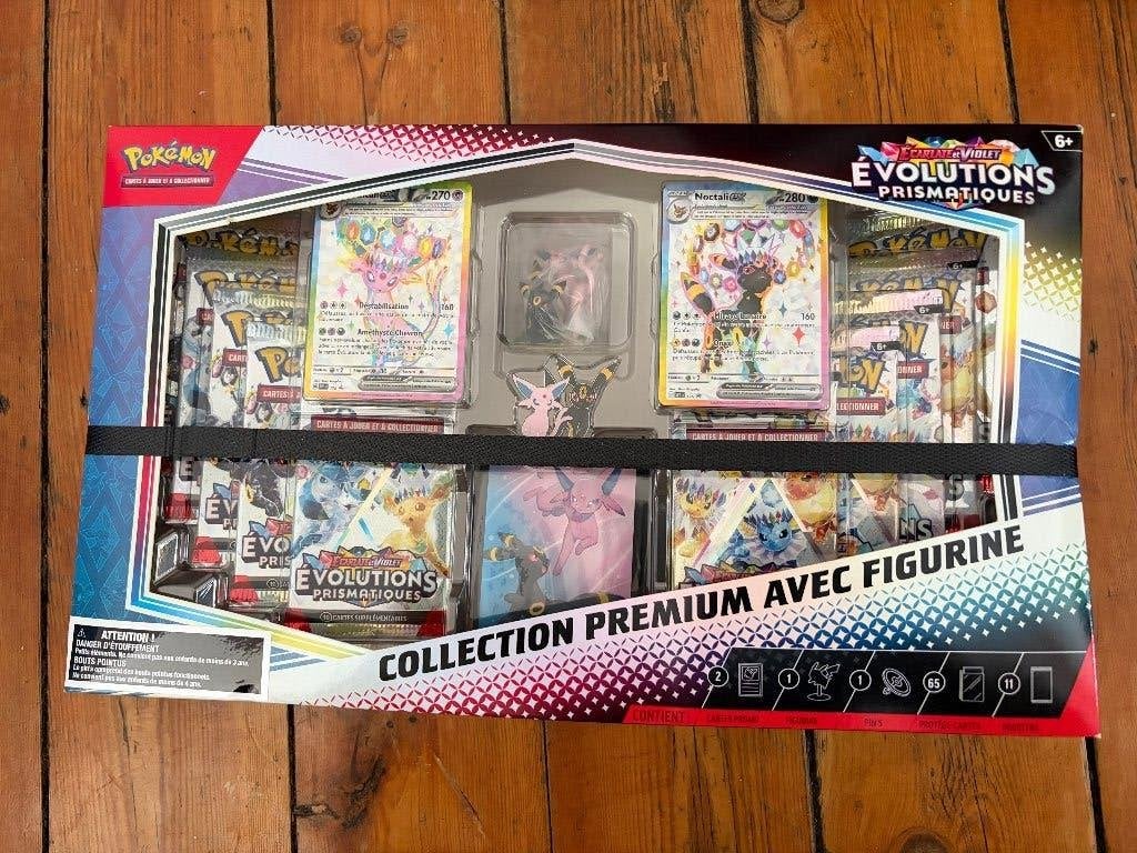 Pokémon Coffret Premium Évolutions Prismatiques Français (2), Enlèvement, Comme neuf, Booster box