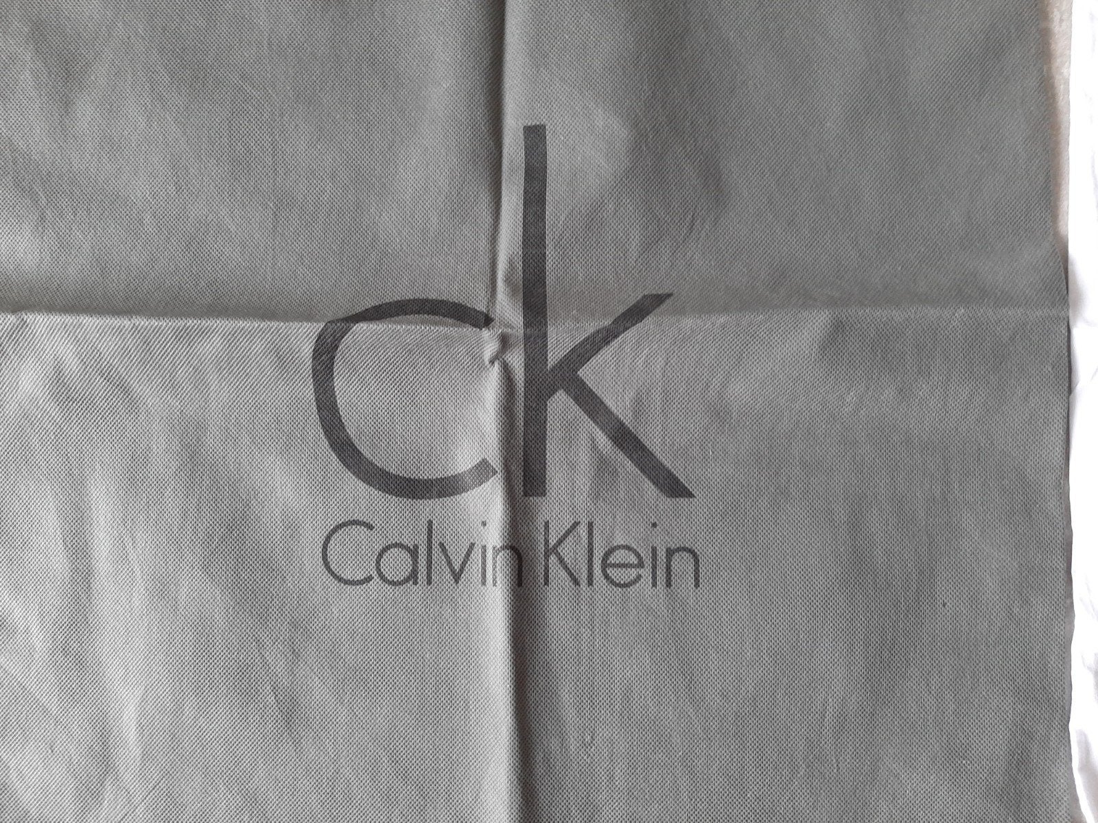 Opbergtas handtas Calvin Klein, Ophalen