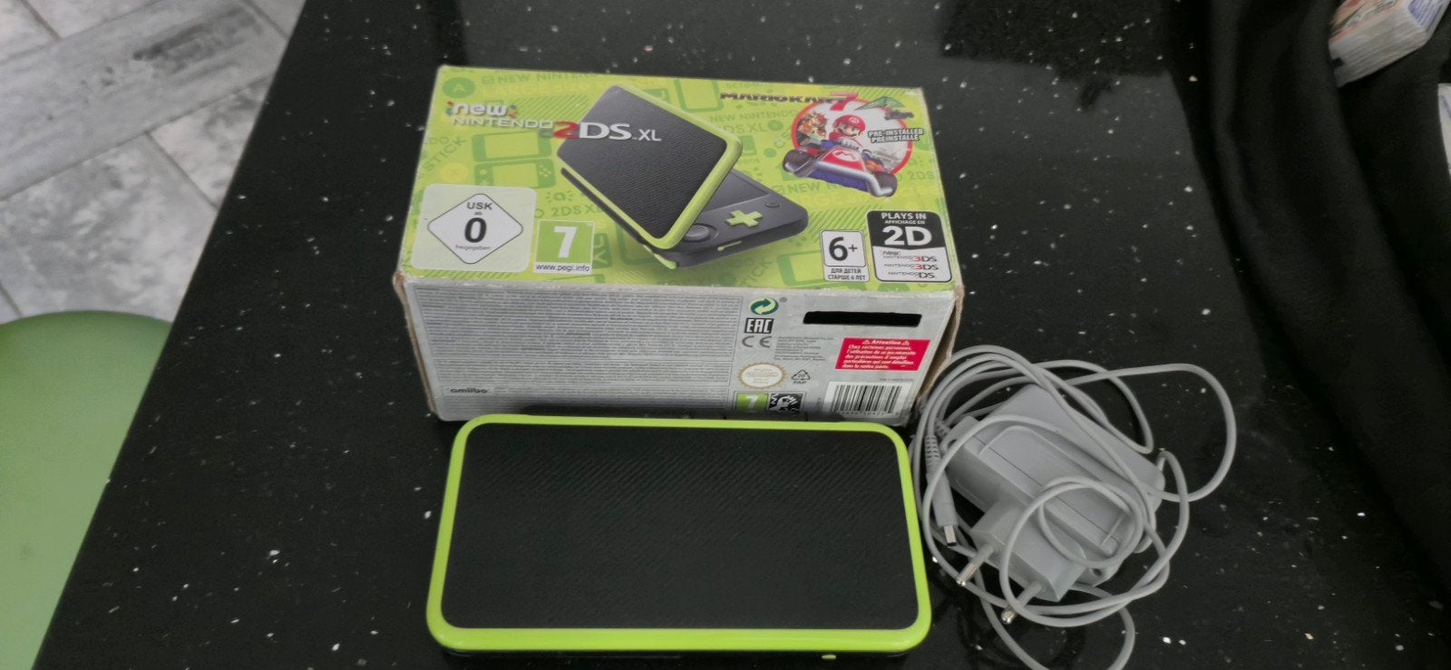 Console Nintendo 2ds xl mariokart7.
Avec plusieurs jeu insta, Enlèvement ou Envoi