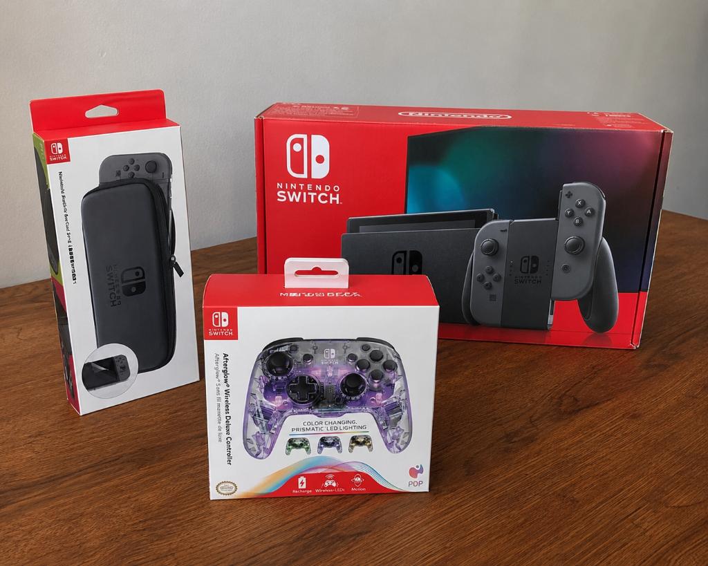 Nintendo Switch (Zwart) + games + extra's, in originele doos, Games en Spelcomputers, Spelcomputers | Nintendo Switch, Zo goed als nieuw