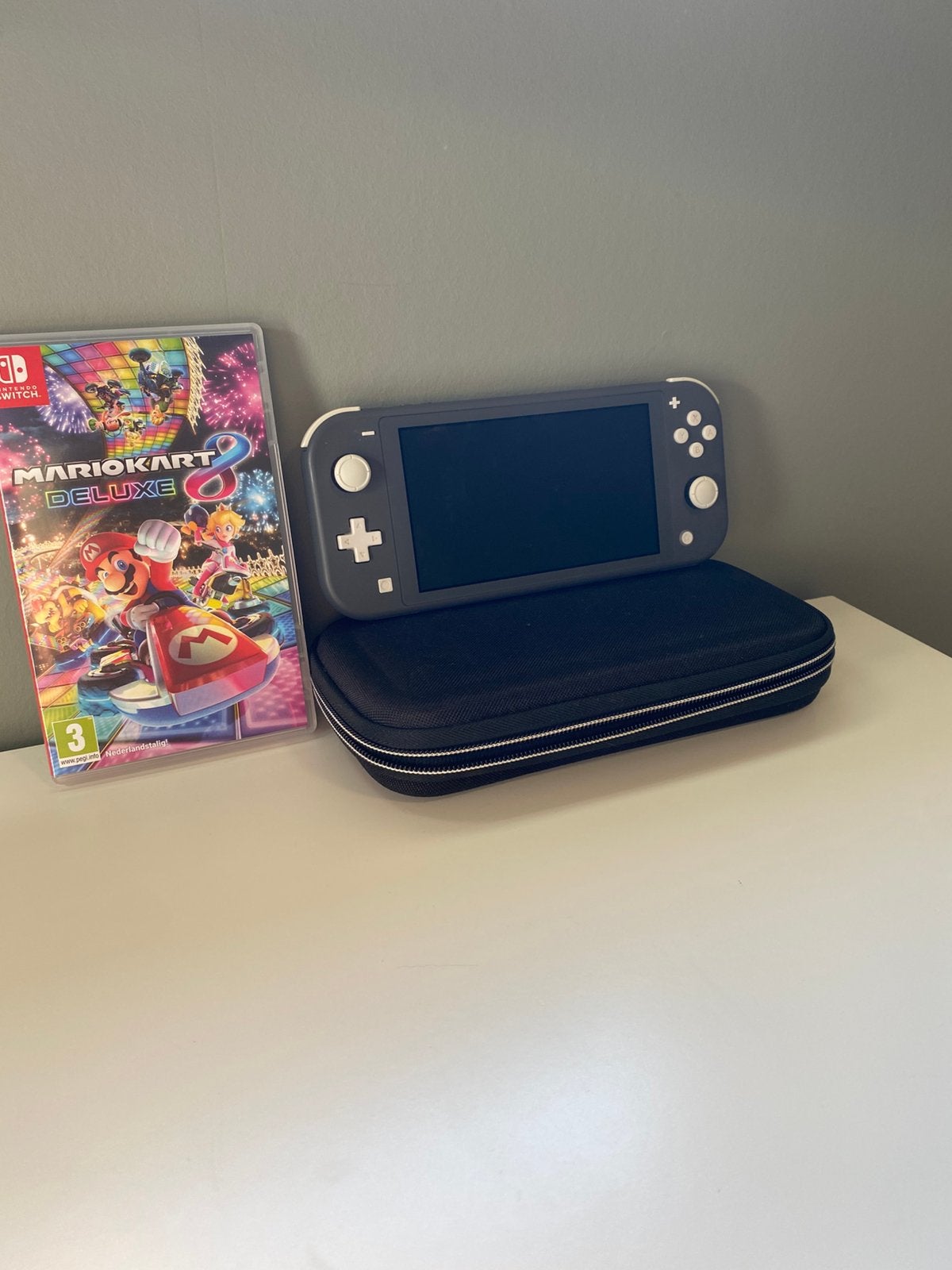 Nitendo Switch Lite + Case + Mariokart, Games en Spelcomputers, Spelcomputers | Nintendo Switch Lite, Ophalen, Grijs, Zo goed als nieuw