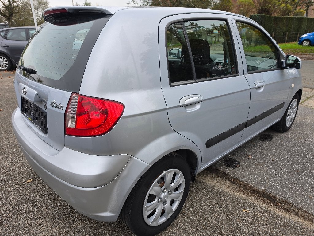 Hyundai Getz 1.4i 2008, 51.345km, Automaat, 5drs, Garantie, Auto's, Stof, 4 cilinders, 5 zetels, https://public.car-pass.be/vhr/57b63815-496d-4e3a-bb69-94e238839a3f