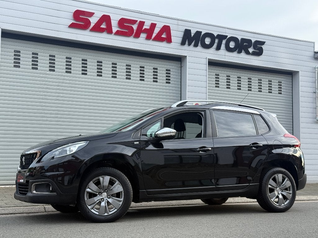 Peugeot 2008 Style 1.2 Benzine | 69.000 KM | 12MGarantie, Auto's, Voorwielaandrijving, Dealer onderhouden, Stof, Zwart