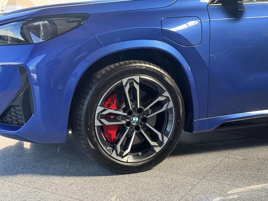 BMW X1 xDrive25e M Sport Pro / PANO / TRKHK / BLIND / MEM, 245 pk, Gebruikt, Zwart, Blauw