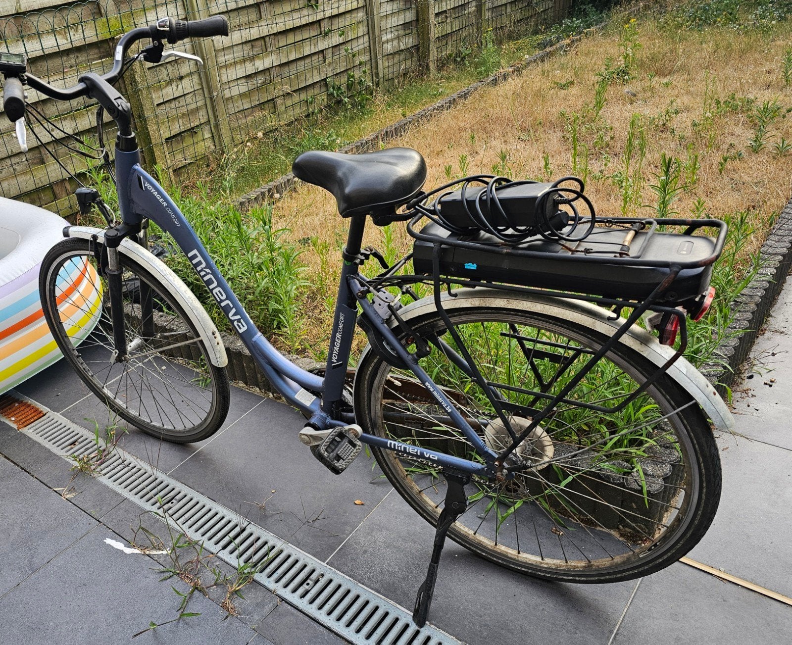 Dames electrische fiets Minerva, 47 tot 51 cm, Ophalen, Gebruikt, 30 tot 50 km per accu