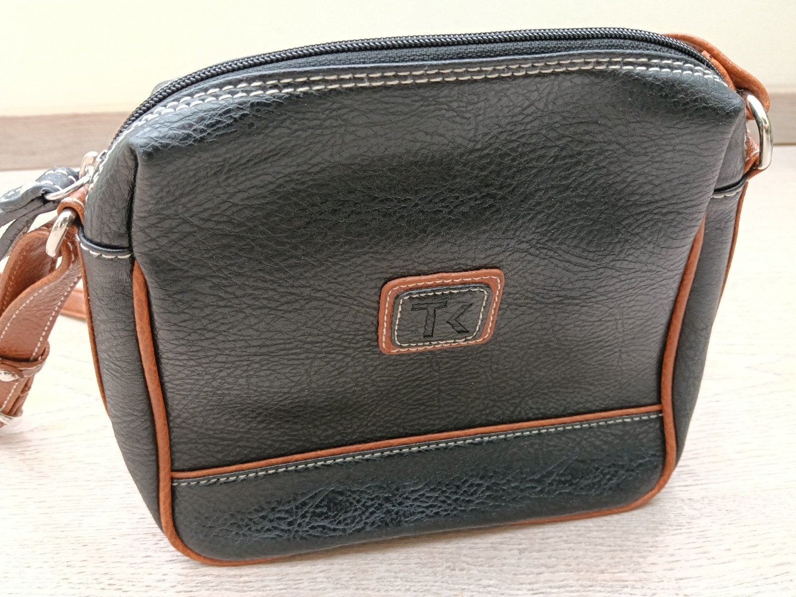 Nieuwe handtas, Ophalen