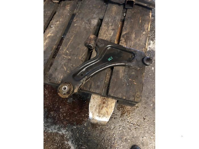 Draagarm rechts-voor van een Opel Corsa, Ophalen of Verzenden, 3 maanden garantie, Gebruikt, Opel