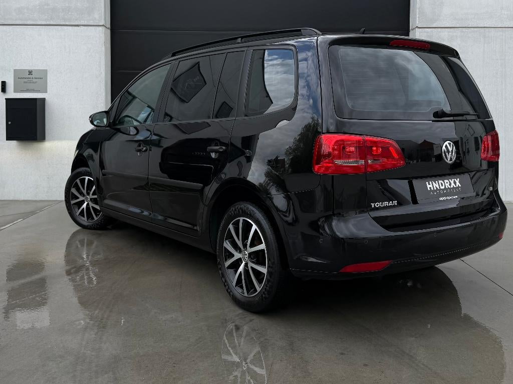 Volkswagen Touran 1.6 TDi 7pl. - Navi - PDC - Cruise - GRNTI, Autos, Volkswagen, Euro 5, Entreprise, Boîte manuelle, Entretenue par le concessionnaire