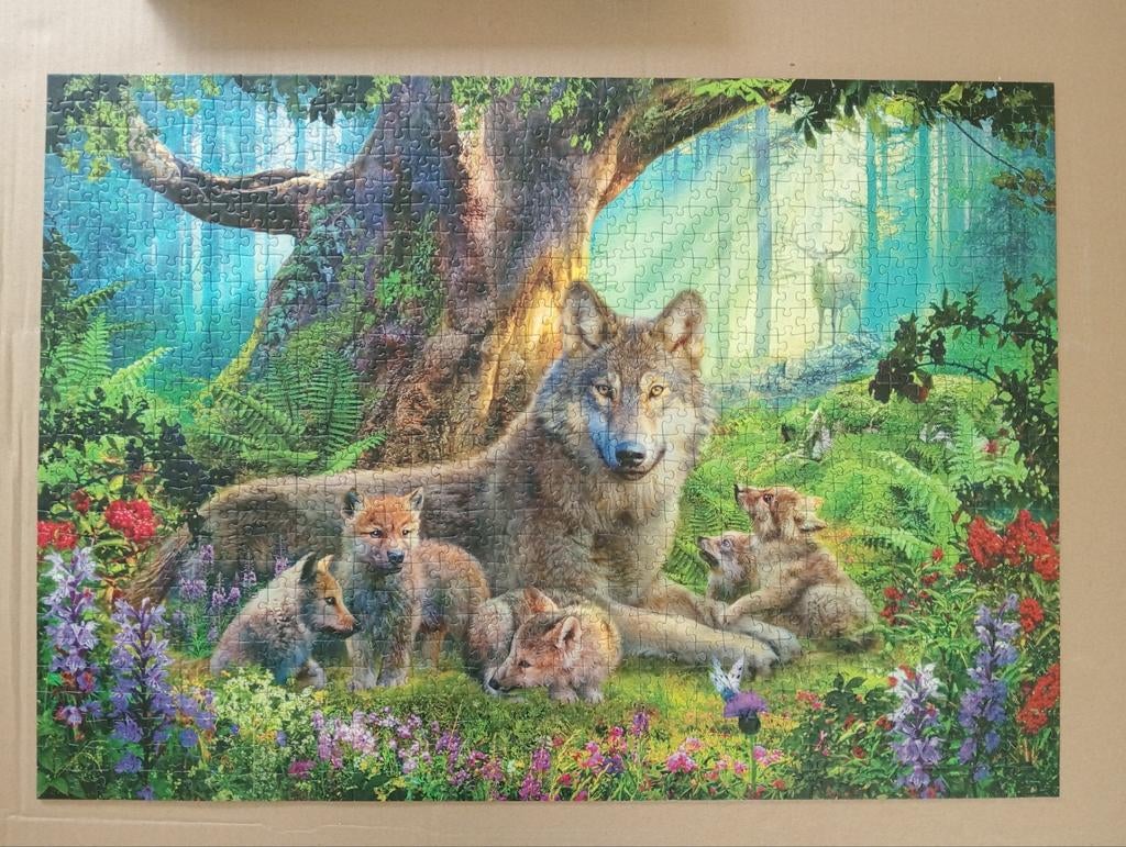 Puzzel Ravensburger 'Familie wolven in het bos', Enlèvement