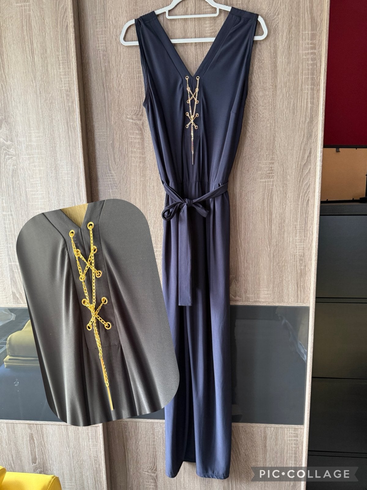 Navy jumpsuit met ketting, Kleding | Dames, Ophalen of Verzenden, Zo goed als nieuw, Maat 42/44 (L), Blauw