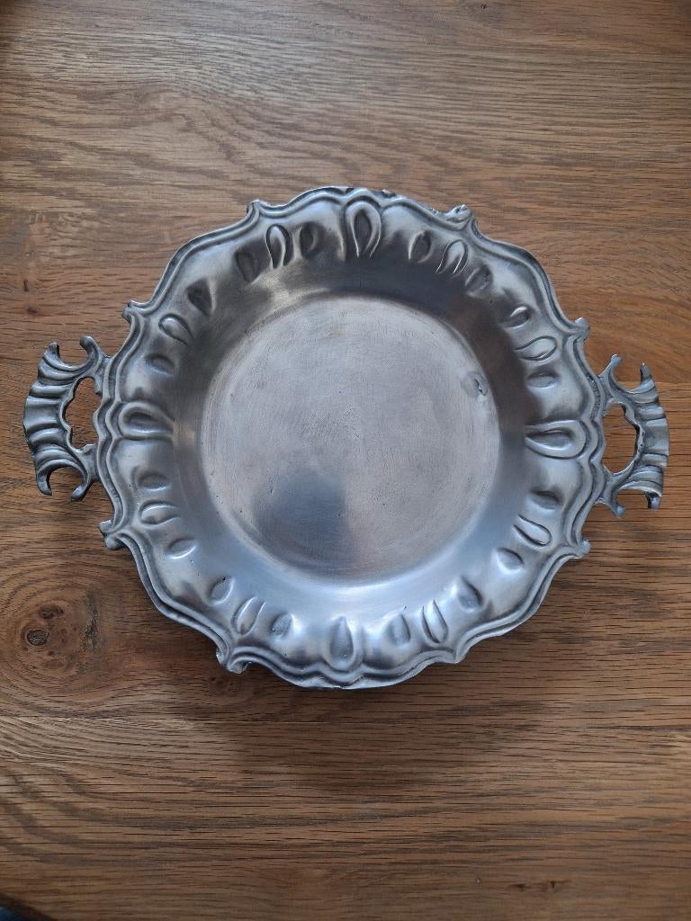 Tinnen bord, Ophalen