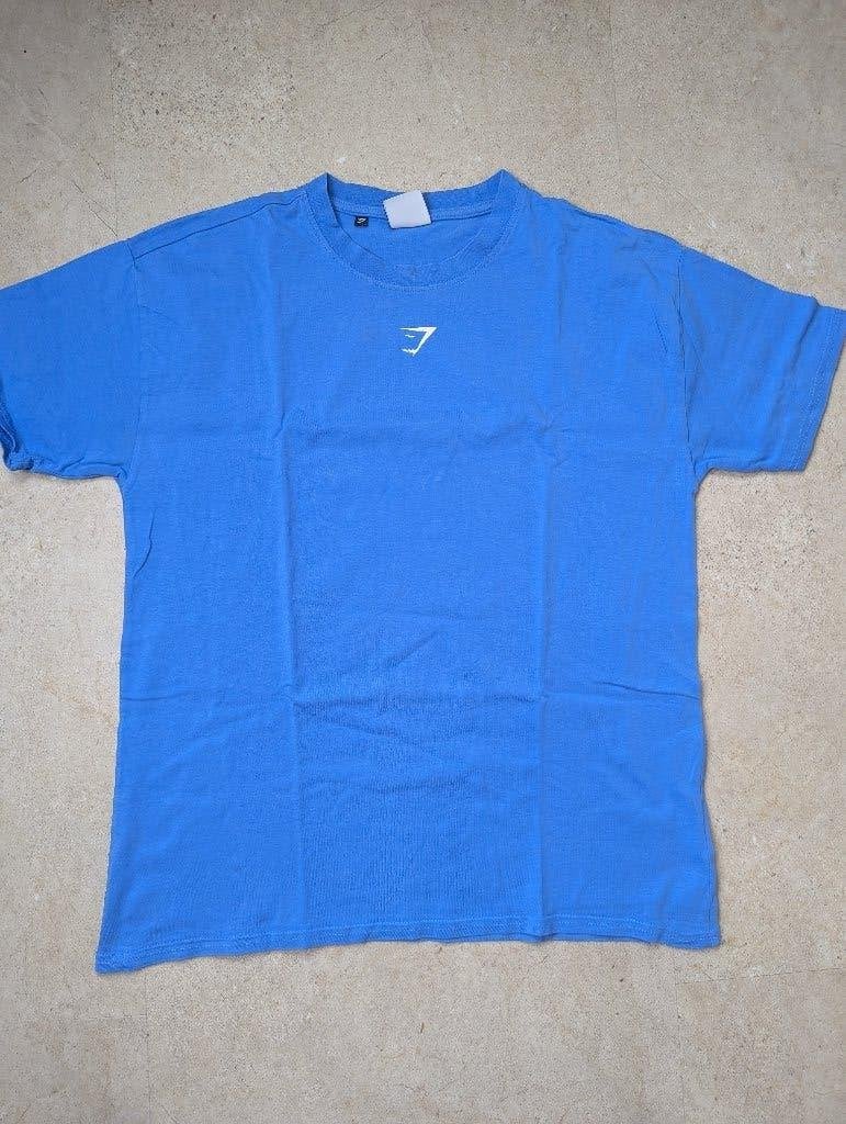 Blauw Gymshark T-shirt, Kleding | Dames, Sportkleding, Maat 38/40 (M), Gymshark, Verzenden, Blauw