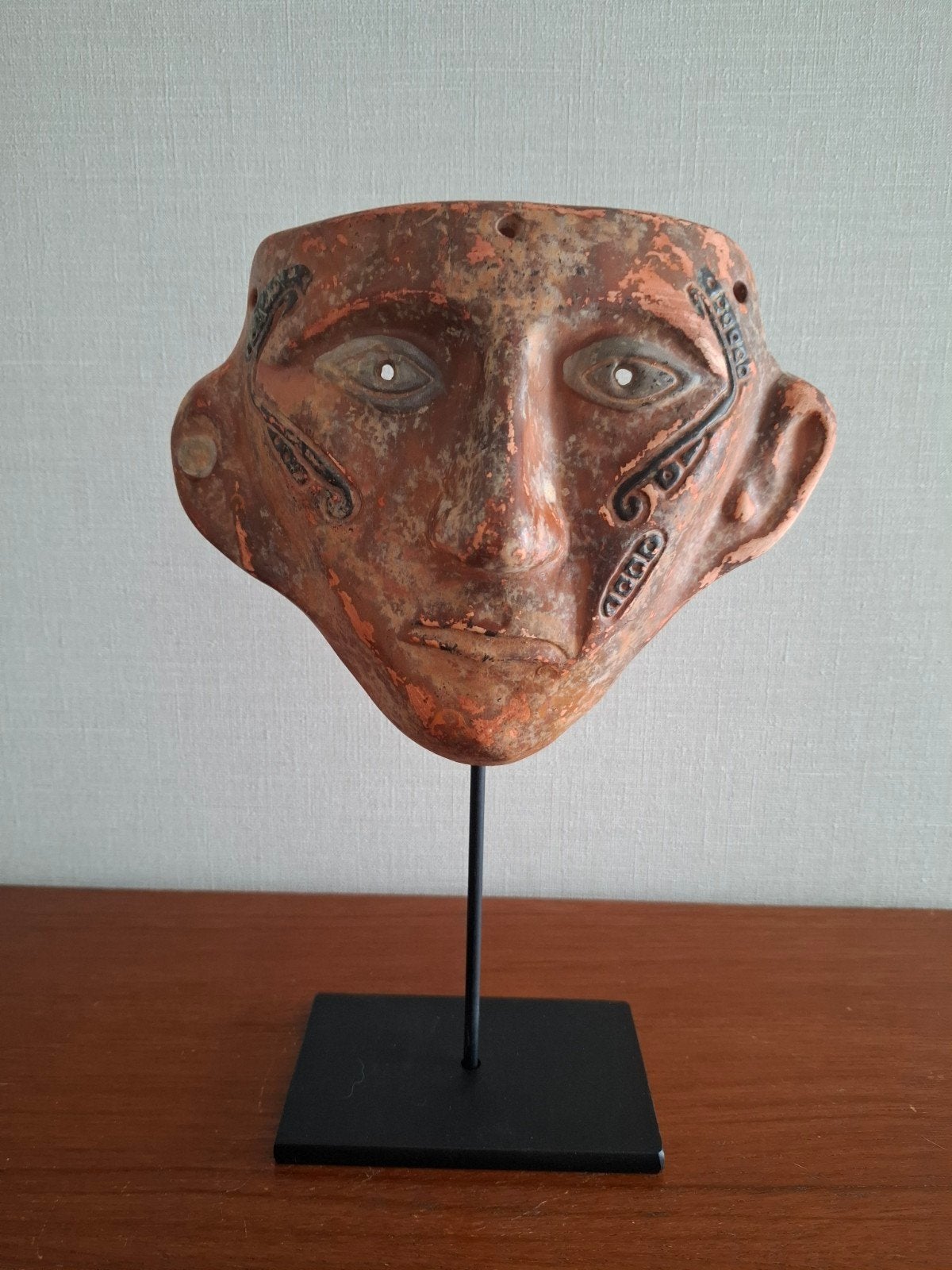 Mooi masker van inca Colombia, Ophalen