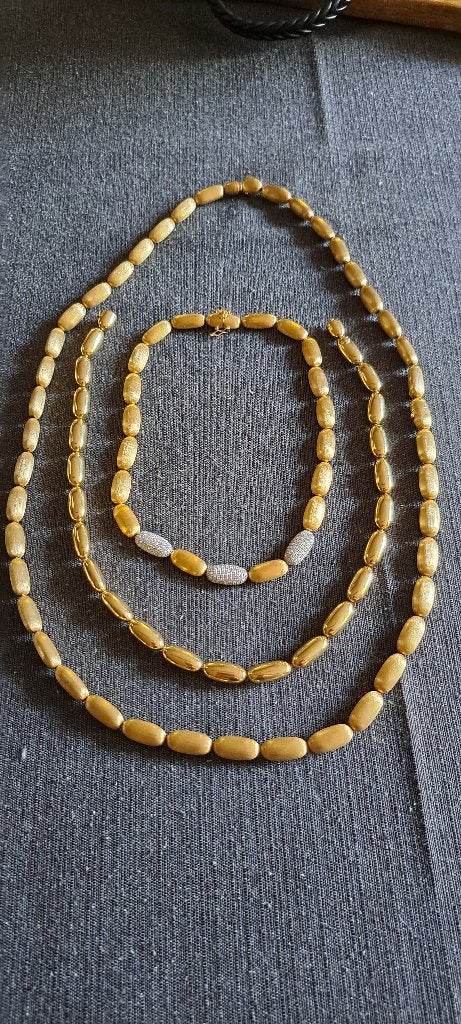 Nanis 18 karaat goud 138g goud met diamanten, Ophalen