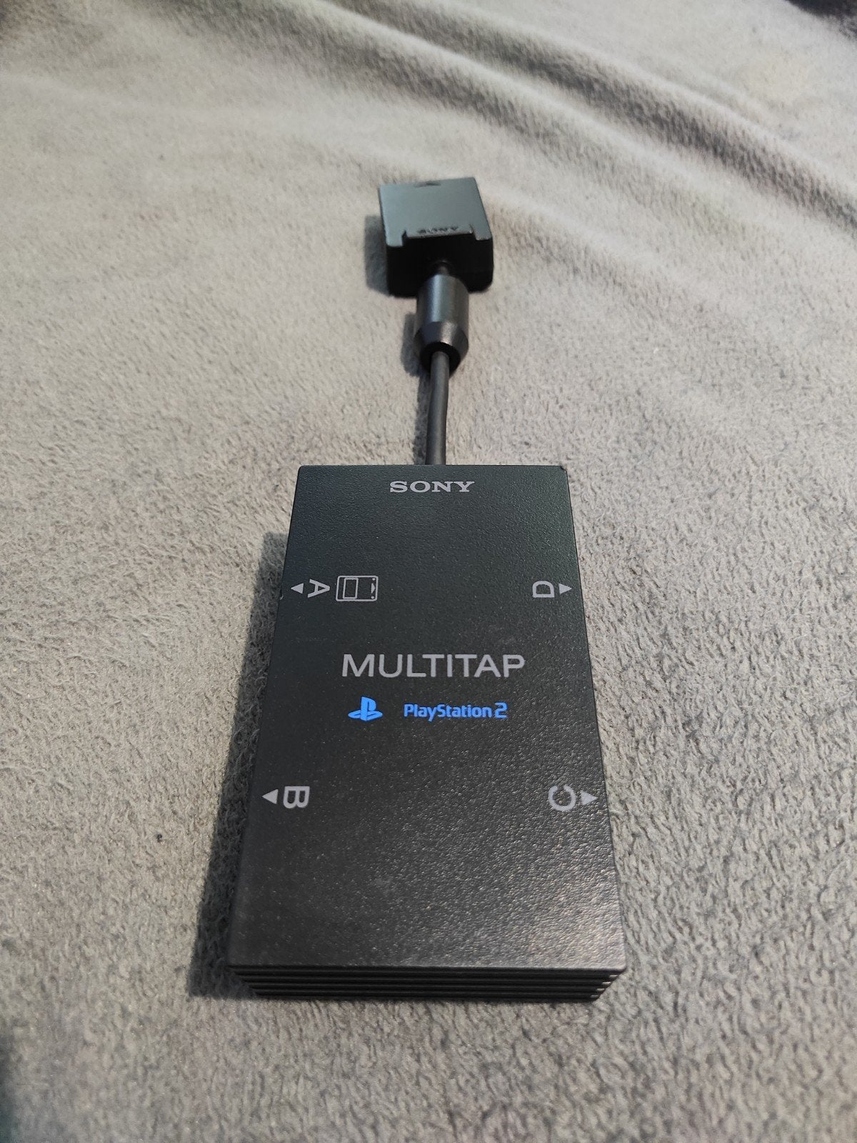 Sony PlayStation 2 Multitap., Games en Spelcomputers, Spelcomputers | Sony PlayStation 2, Ophalen of Verzenden, Gebruikt, Zwart
