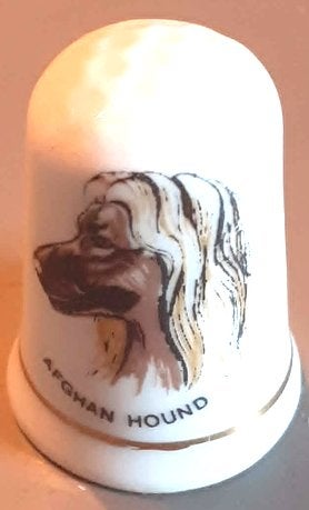 dés a coudre de collection porcelaine serie chien (5), Verzamelen, Vingerhoedjes, Ophalen of Verzenden, Zo goed als nieuw, Porselein
