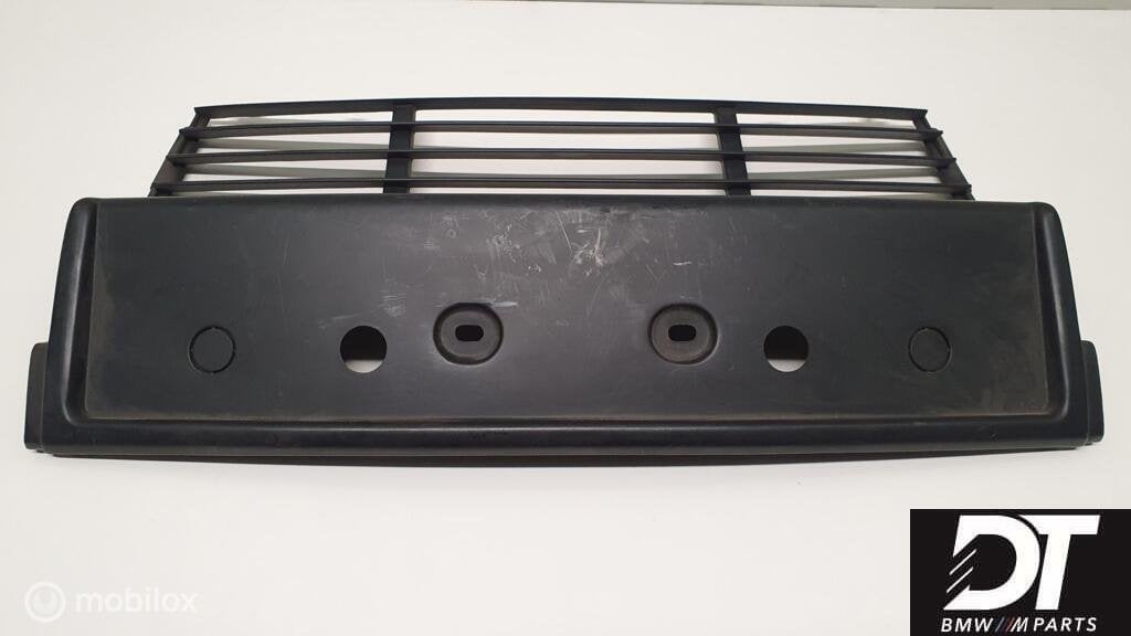 Kentekenplaathouder / grill BMW 5-serie E34 51111934337, Auto-onderdelen, Carrosserie, BMW, Nieuw, Ophalen of Verzenden