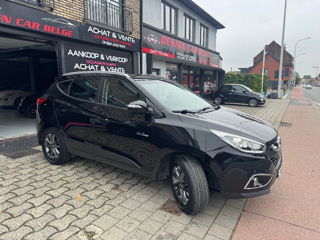 Hyundai iX35 4x2 1.6 GDi 134 pk Cosmo 1ste hands Navigatie, Auto's, Zwart, Zwart, Bedrijf, Handgeschakeld