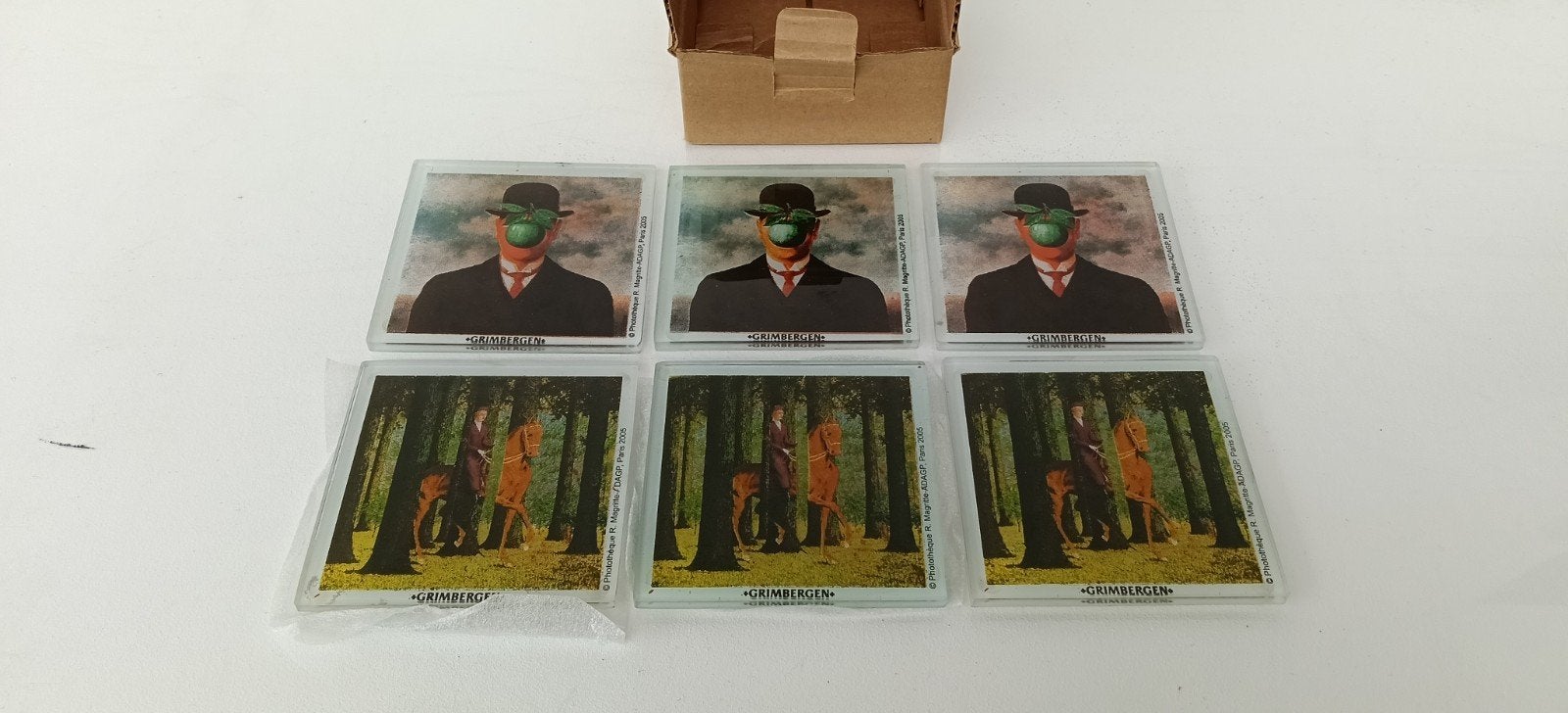 €3 voor 6 onderleggers onderzetters Grimbergen René Magritte, Verzamelen, Ophalen of Verzenden