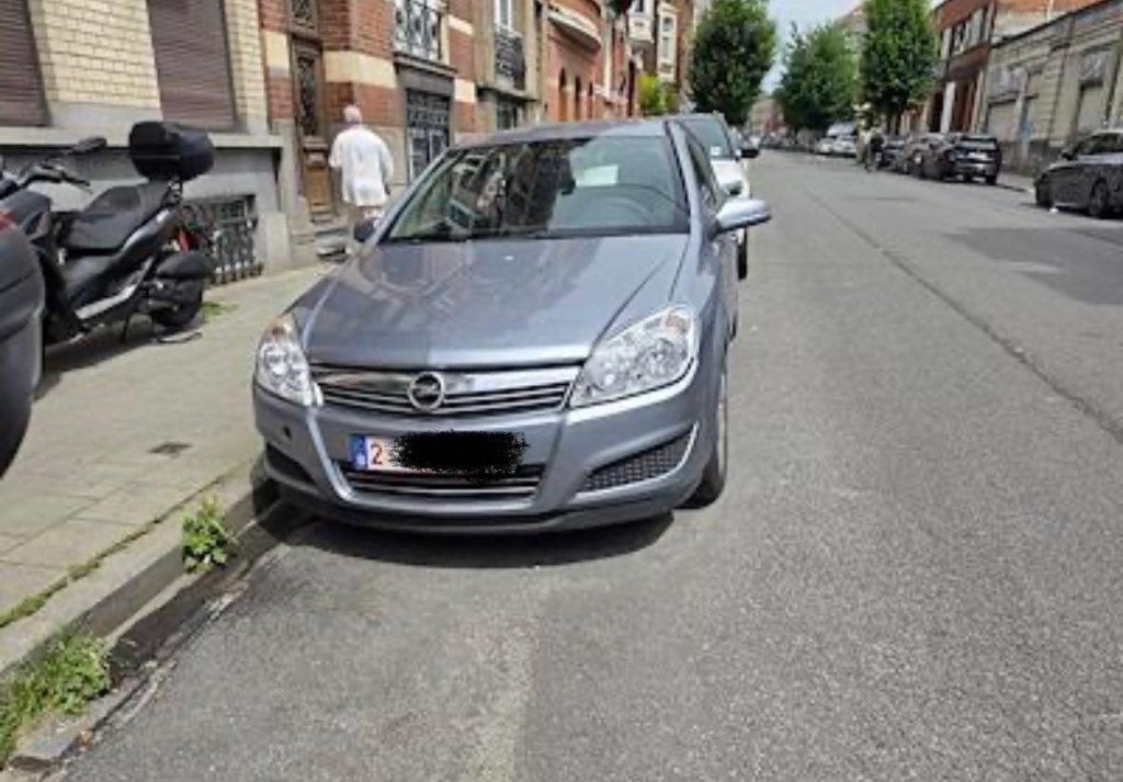 Opel Astra 1.4 Essence – 2009 – 150.000 km, Autos, Argent ou Gris, Achat, Boîte manuelle, Noir
