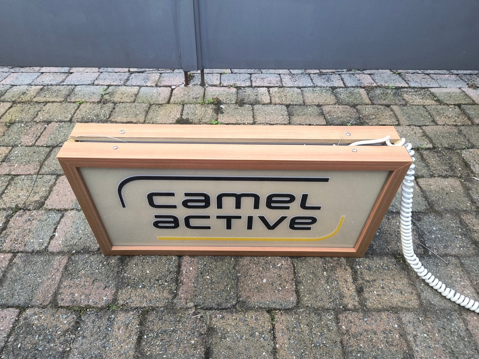 Lichtreclame Camel active, Ophalen, Zo goed als nieuw
