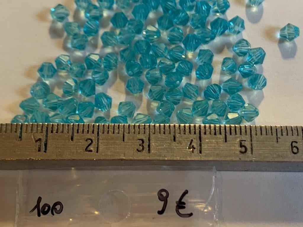 100 Swarovski tolletjes turkois transparant, Ophalen of Verzenden, Nieuw, Kraal