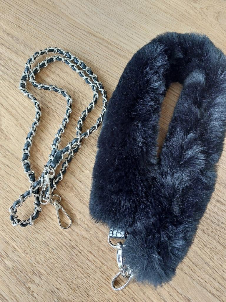 Handvatten handtas, Enlèvement
