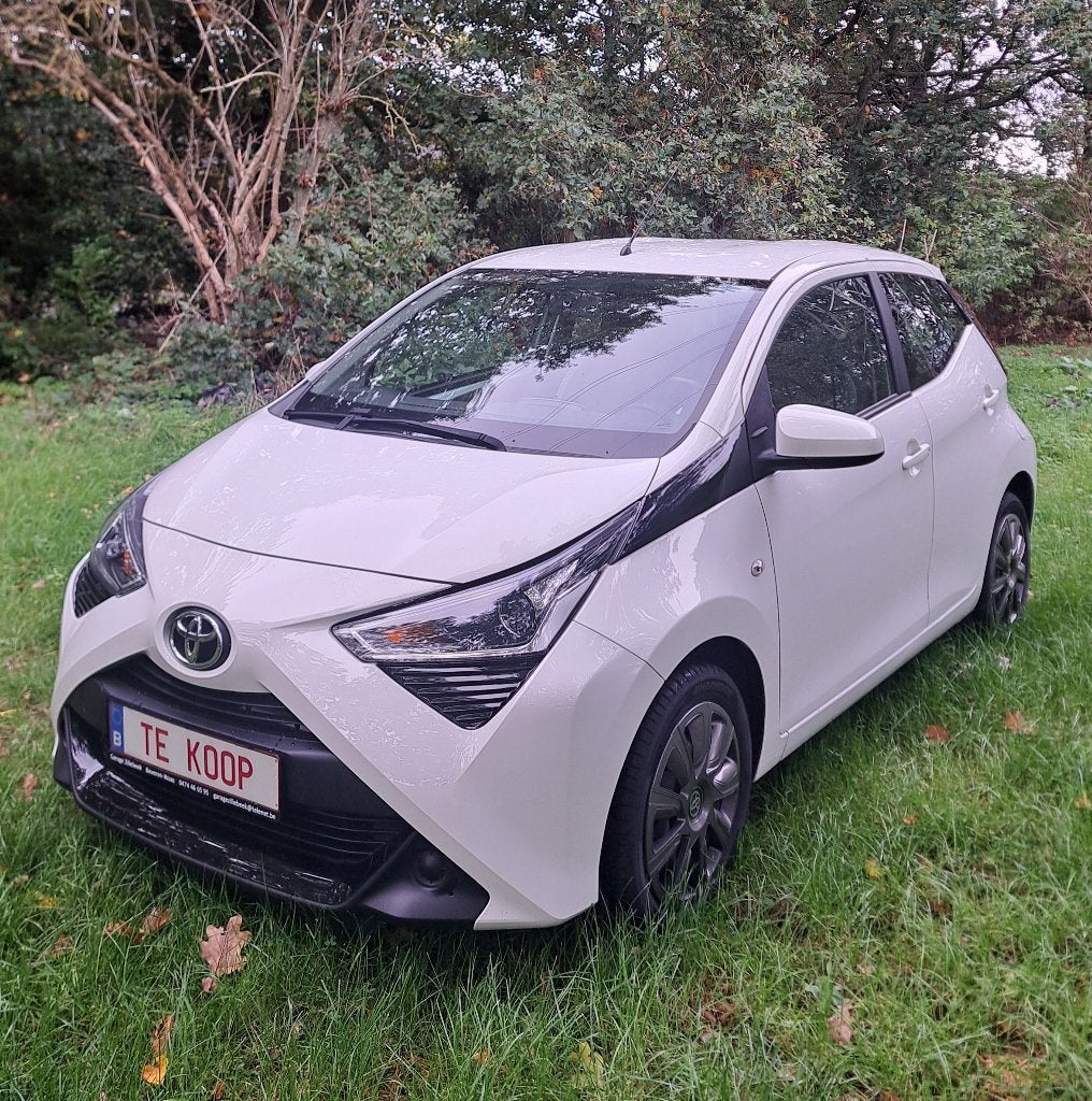 Toyota Aygo: 59.000km +airco +jaar garantie +groot nazicht!, Auto's, Voorwielaandrijving, 4 zetels, Stof, Euro 6