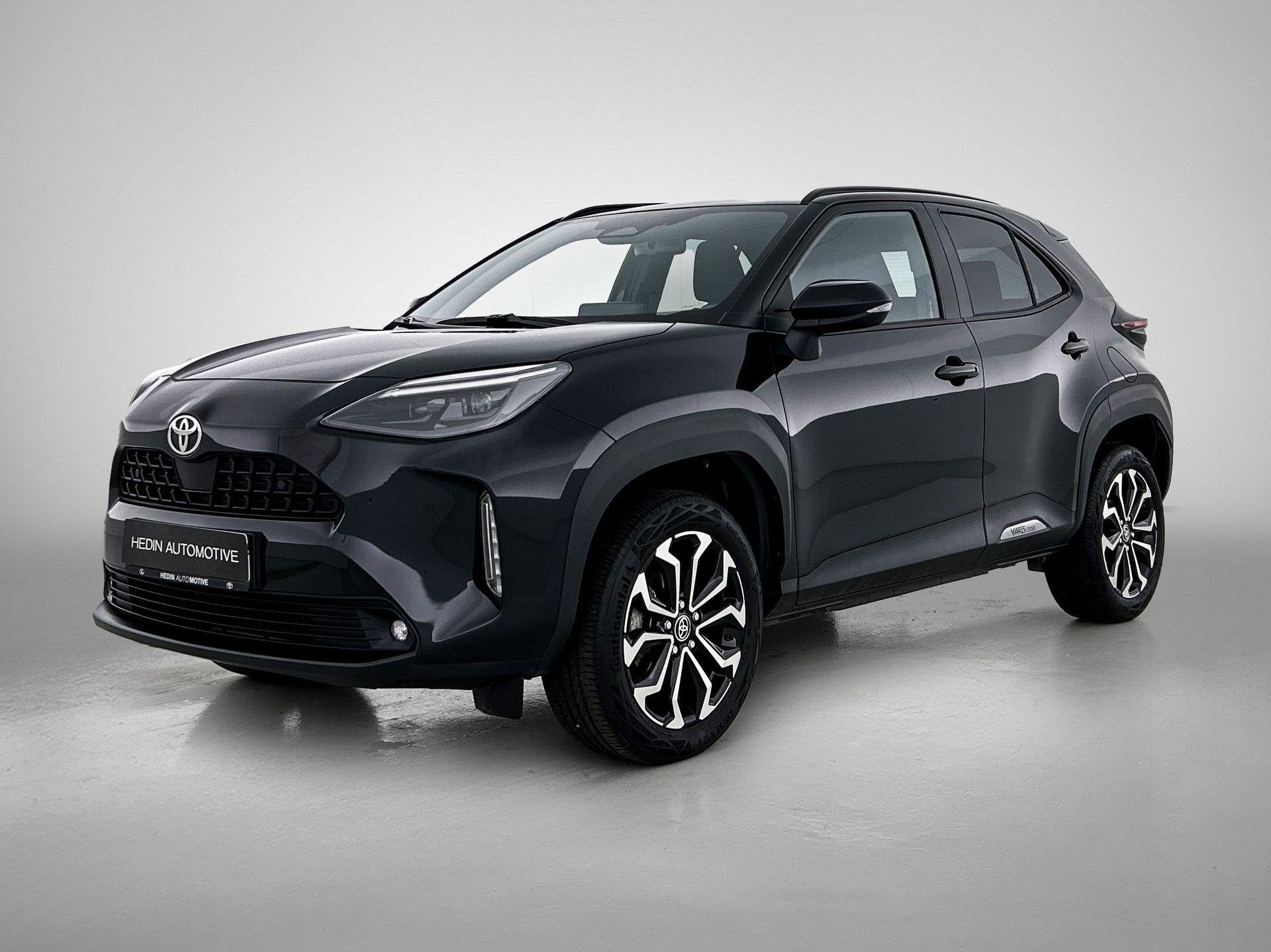 Toyota Yaris Cross 1.5 VVT-ie Hybrid 85kW Dynamic CVT, Auto's, Toyota, Stof, Gebruikt, 750 kg, Overige kleuren