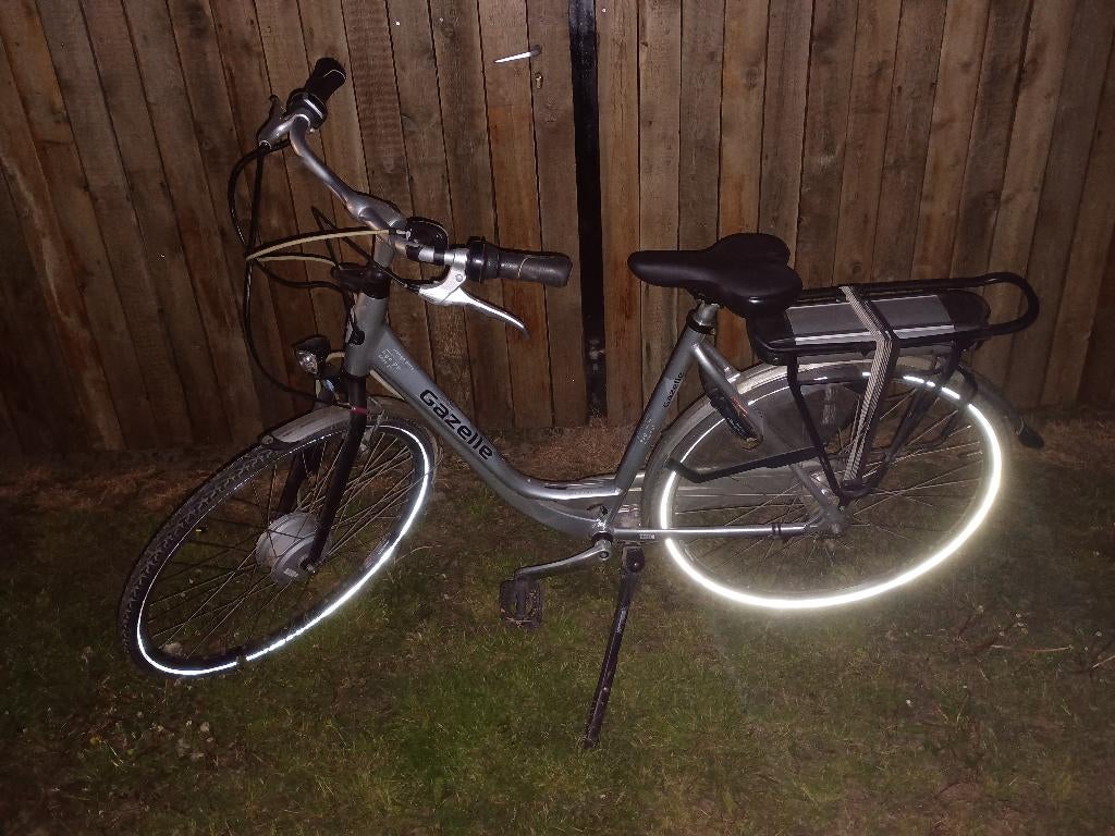 Gazelle Orange Pure fiets maat 53 met stille voorwielmotor, Fietsen en Brommers, Ophalen, Minder dan 30 km per accu, Gebruikt