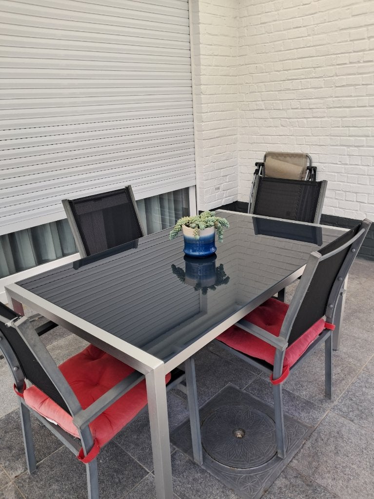 tuintafel van alu/gerookt glas + 4 stoelen, Tuin en Terras, Tuintafels, Ophalen, Gebruikt, Rechthoekig, Aluminium