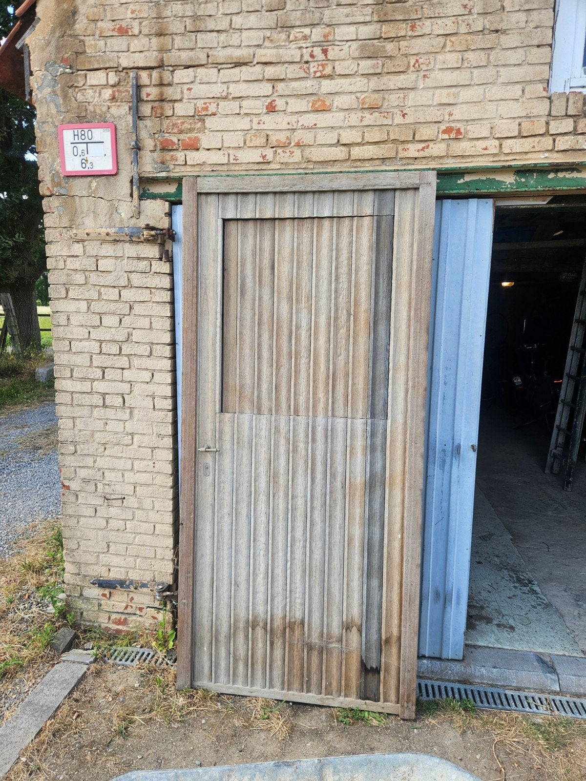 deur voor paardenstal uit 2 delen, Ophalen