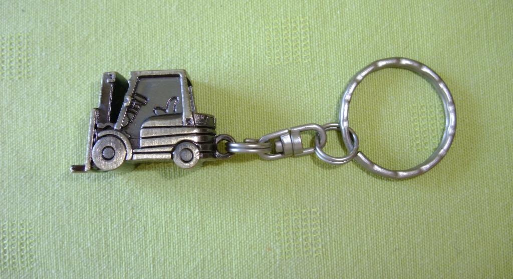 Originele metalen sleutelhanger met Clark - NIEUW, Verzamelen, Ophalen of Verzenden, Nieuw