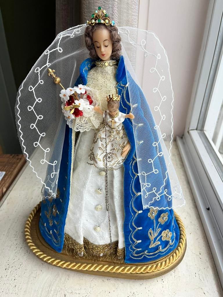 Beeld Maria met kind Jezus onder stolp, Ophalen