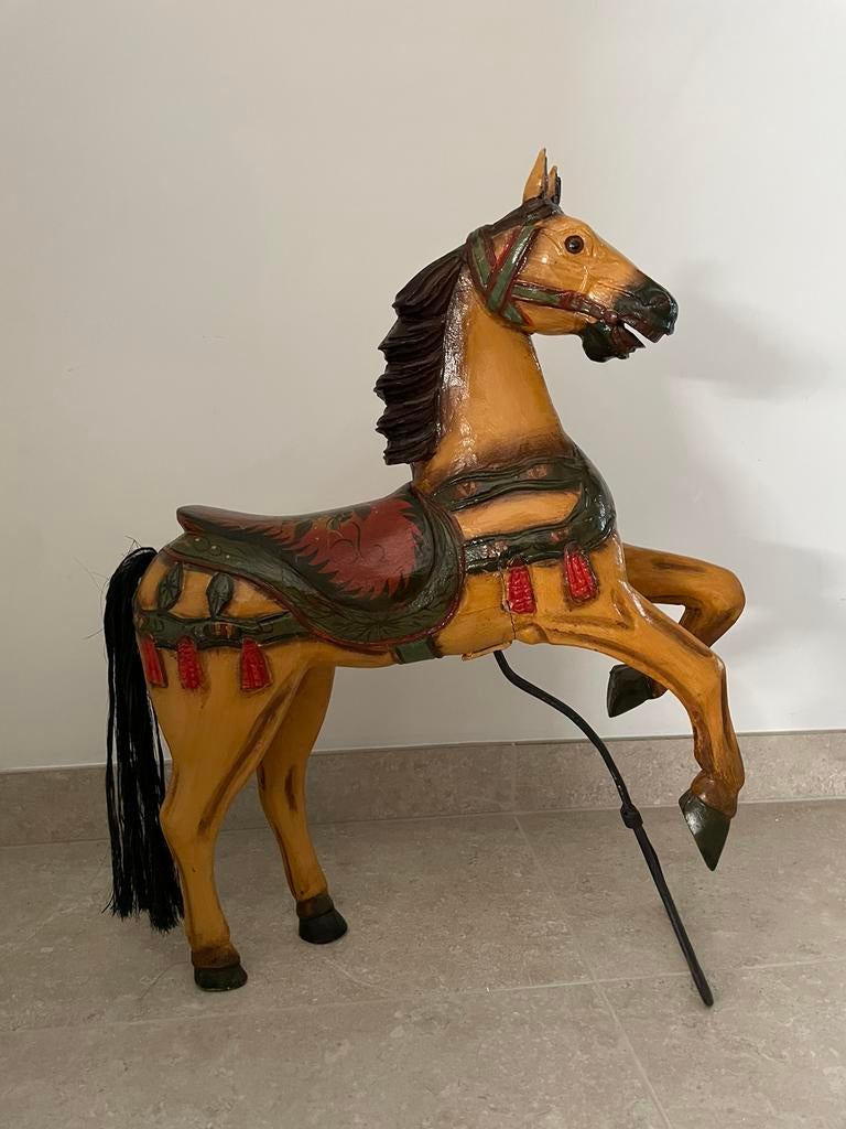 Carousel paard, Ophalen