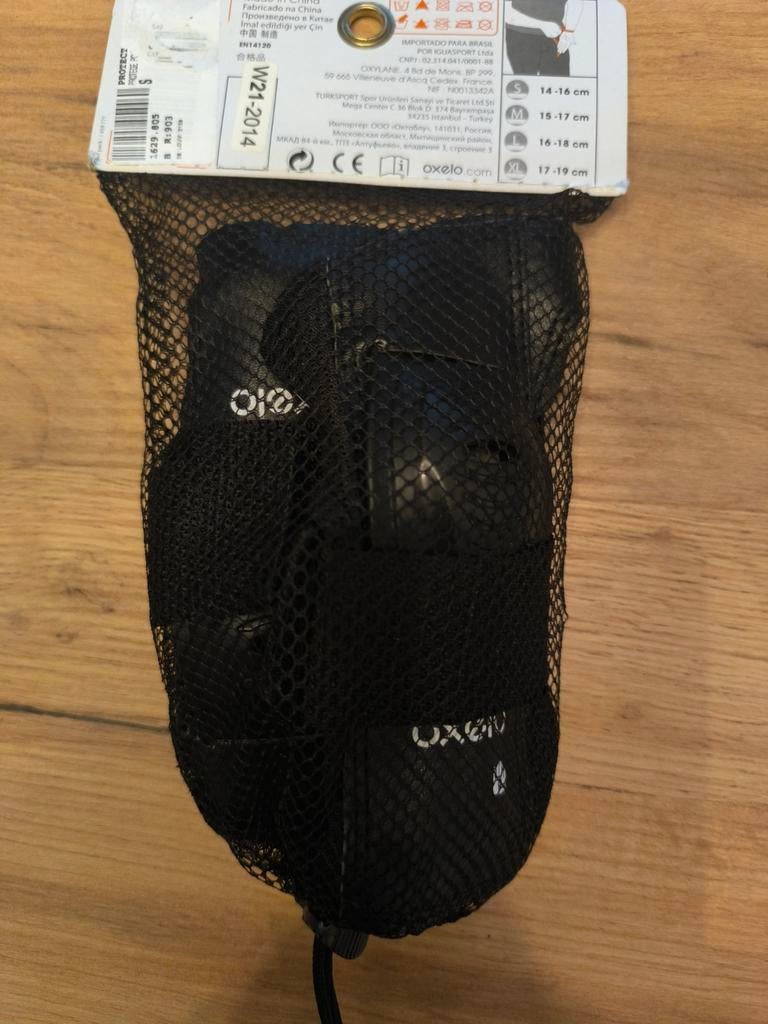 Protections poignets enfant, Ophalen