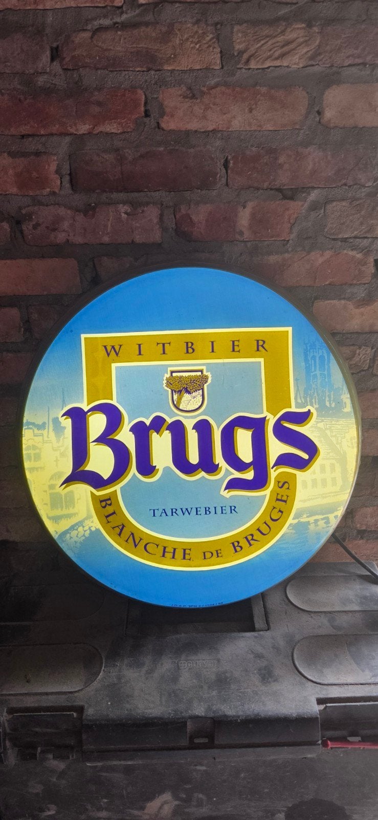 Lichtreclame Brugs tarwebier., Ophalen