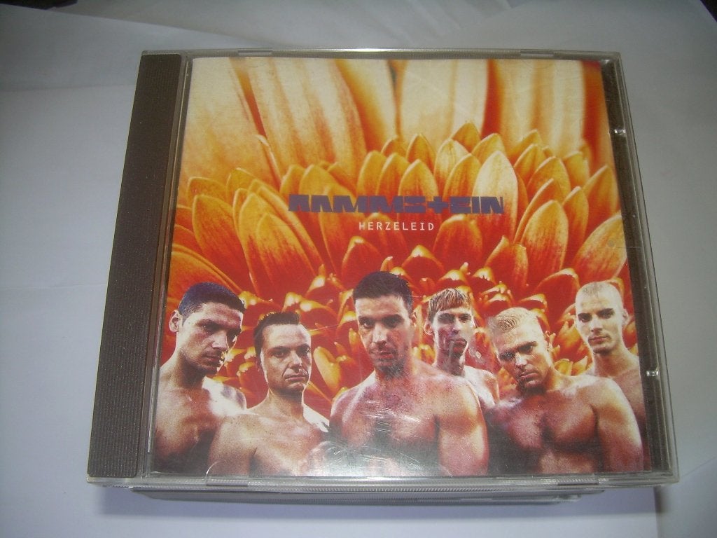 CD - Rammstein - Herzeleid, CD & DVD, Enlèvement ou Envoi, Premier pressage, Comme neuf, Hard rock